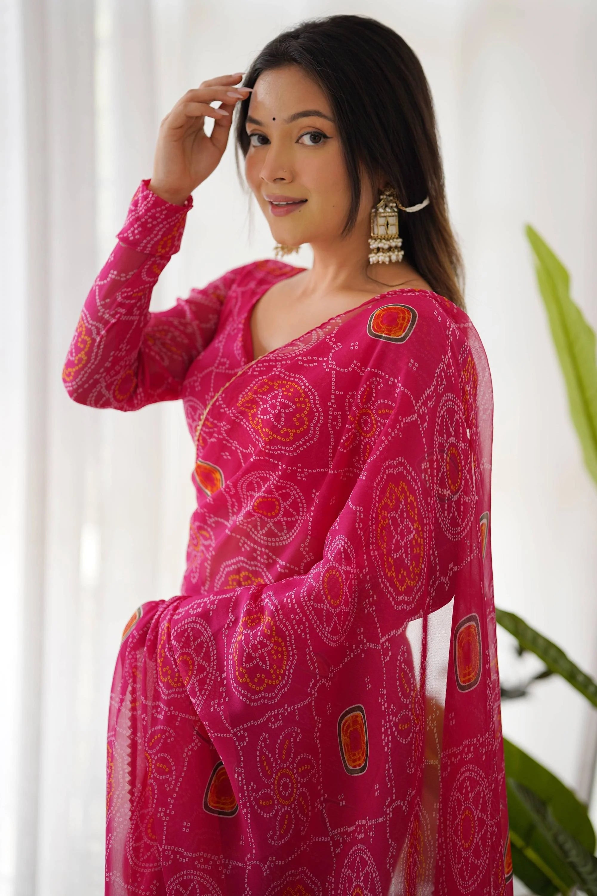 Upgrade your Wardrobe with our Exquisite Bandhej Pink Ready-to-Wear Saree