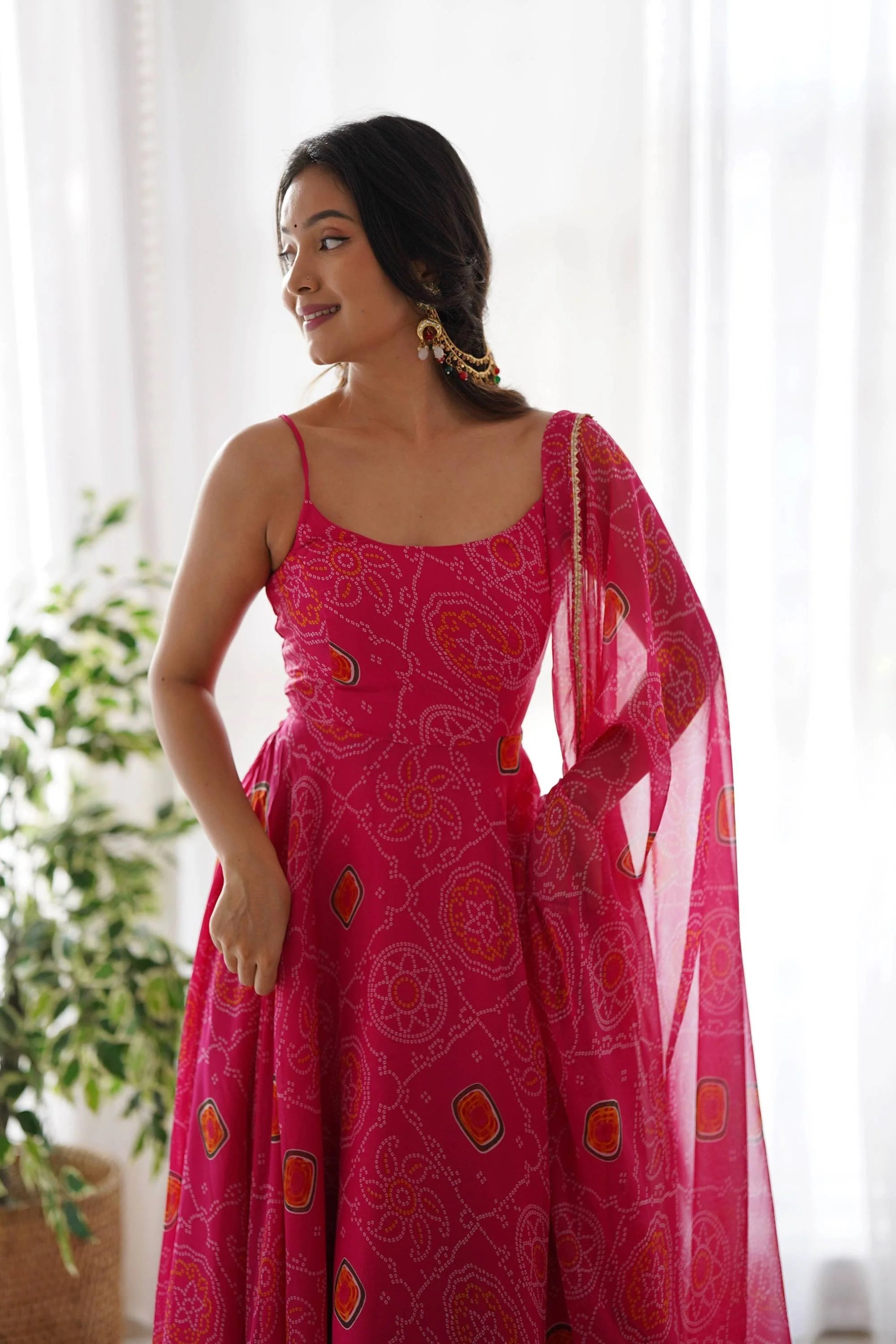 Flaunt Your Style with our Ready-to-Wear Pink Bandhej Print Chiffon Gown