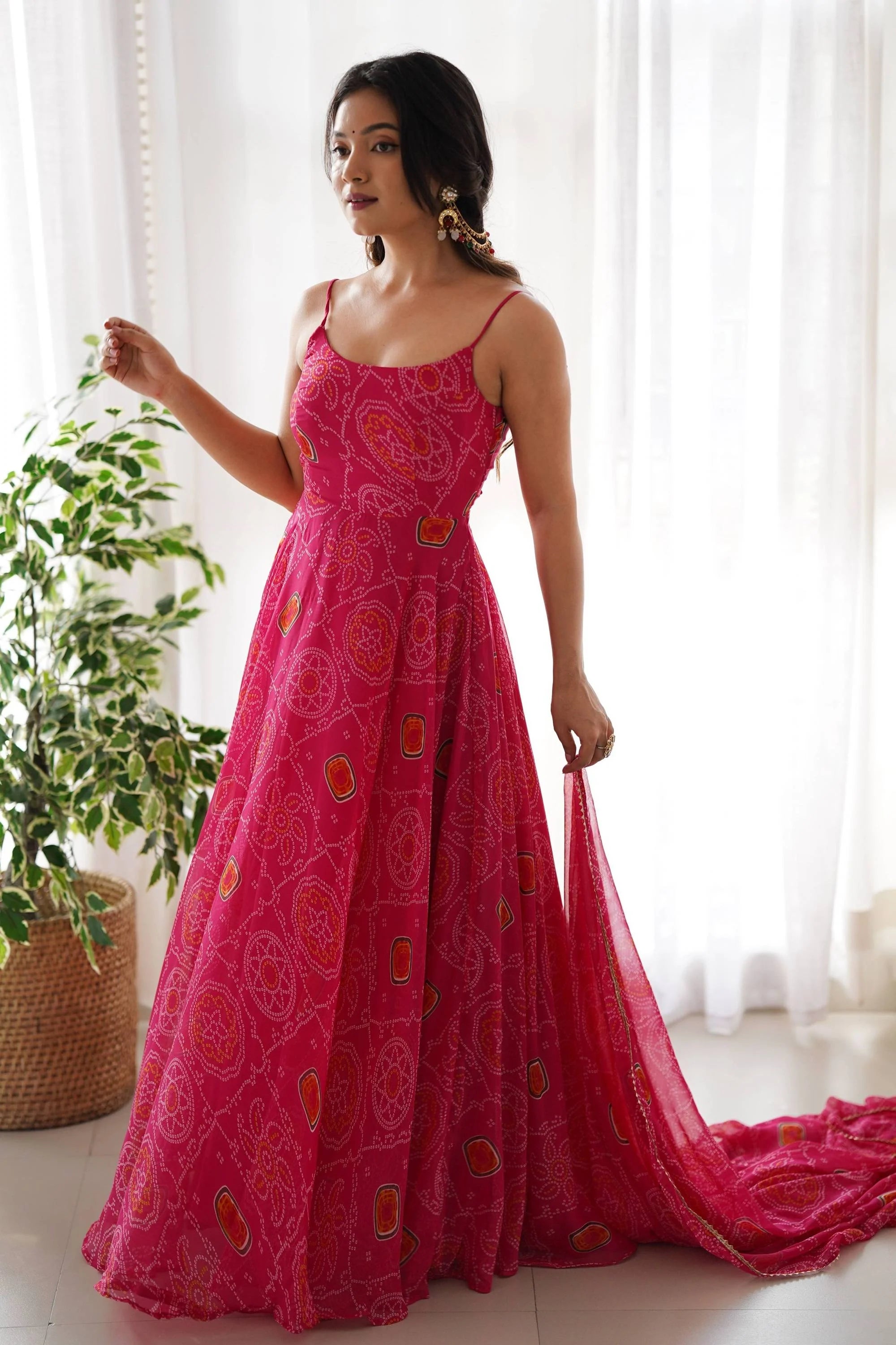 Flaunt Your Style with our Ready-to-Wear Pink Bandhej Print Chiffon Gown