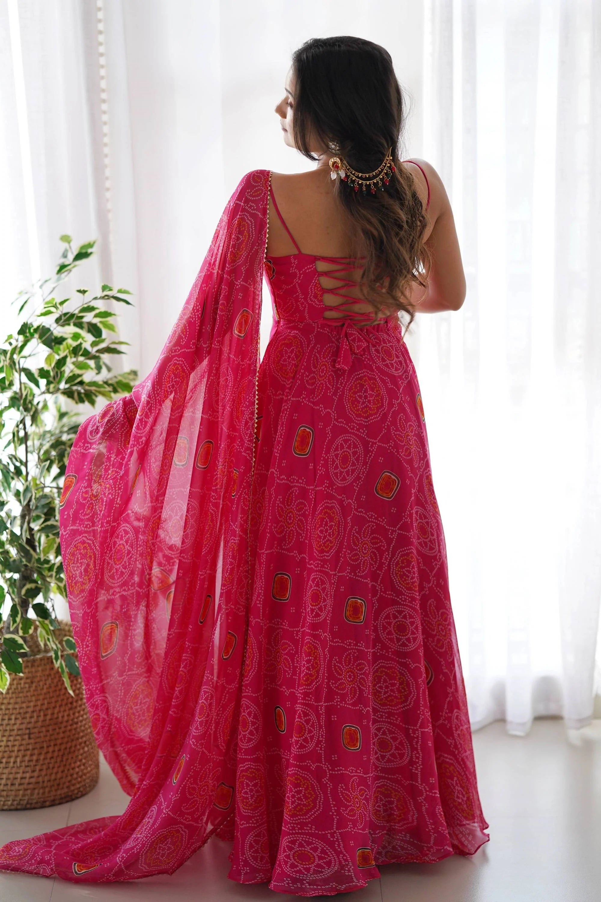 Flaunt Your Style with our Ready-to-Wear Pink Bandhej Print Chiffon Gown