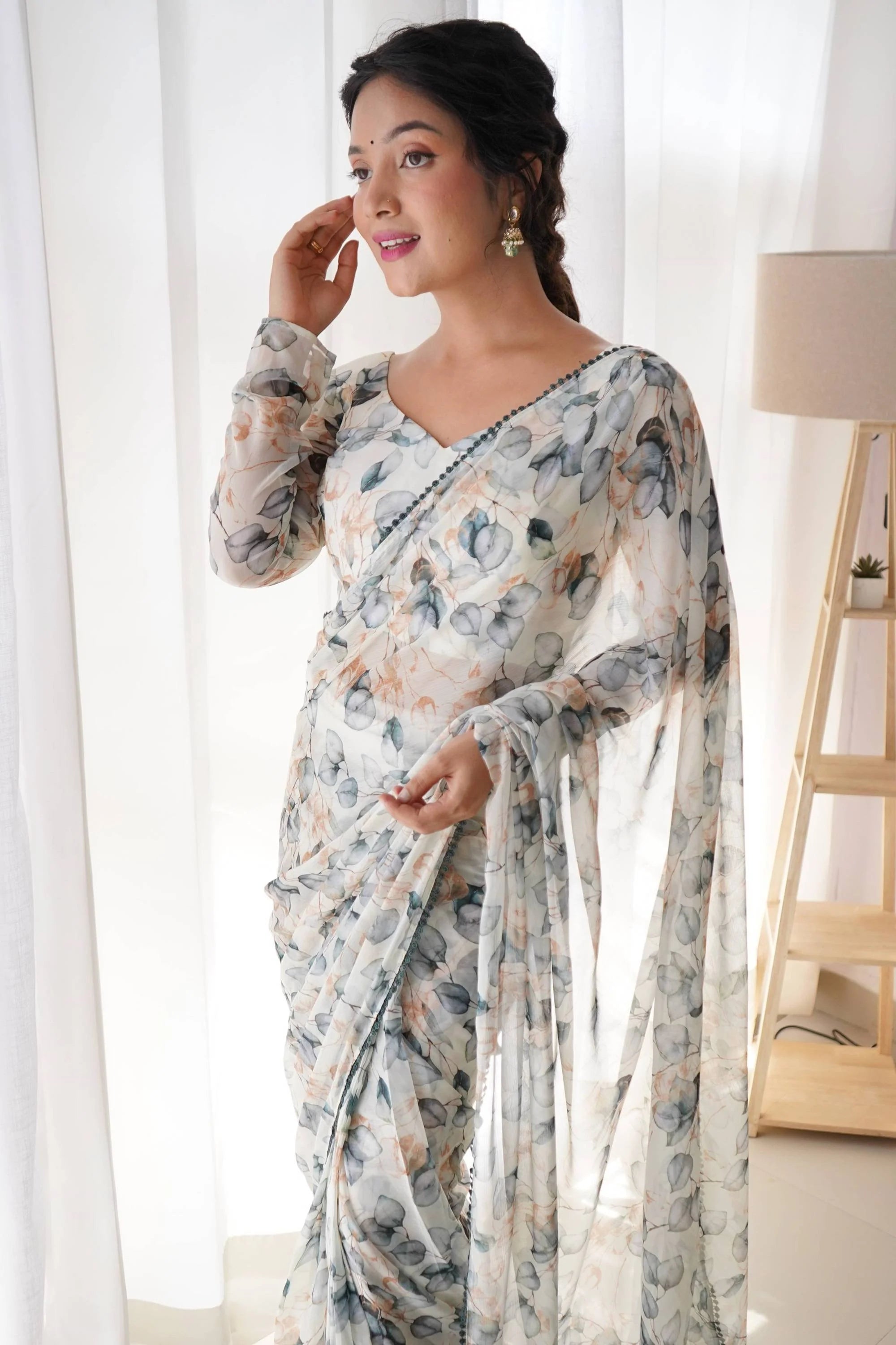 Step Up Your Style Game with This Gorgeous Cream Leaf Print Chiffon Saree