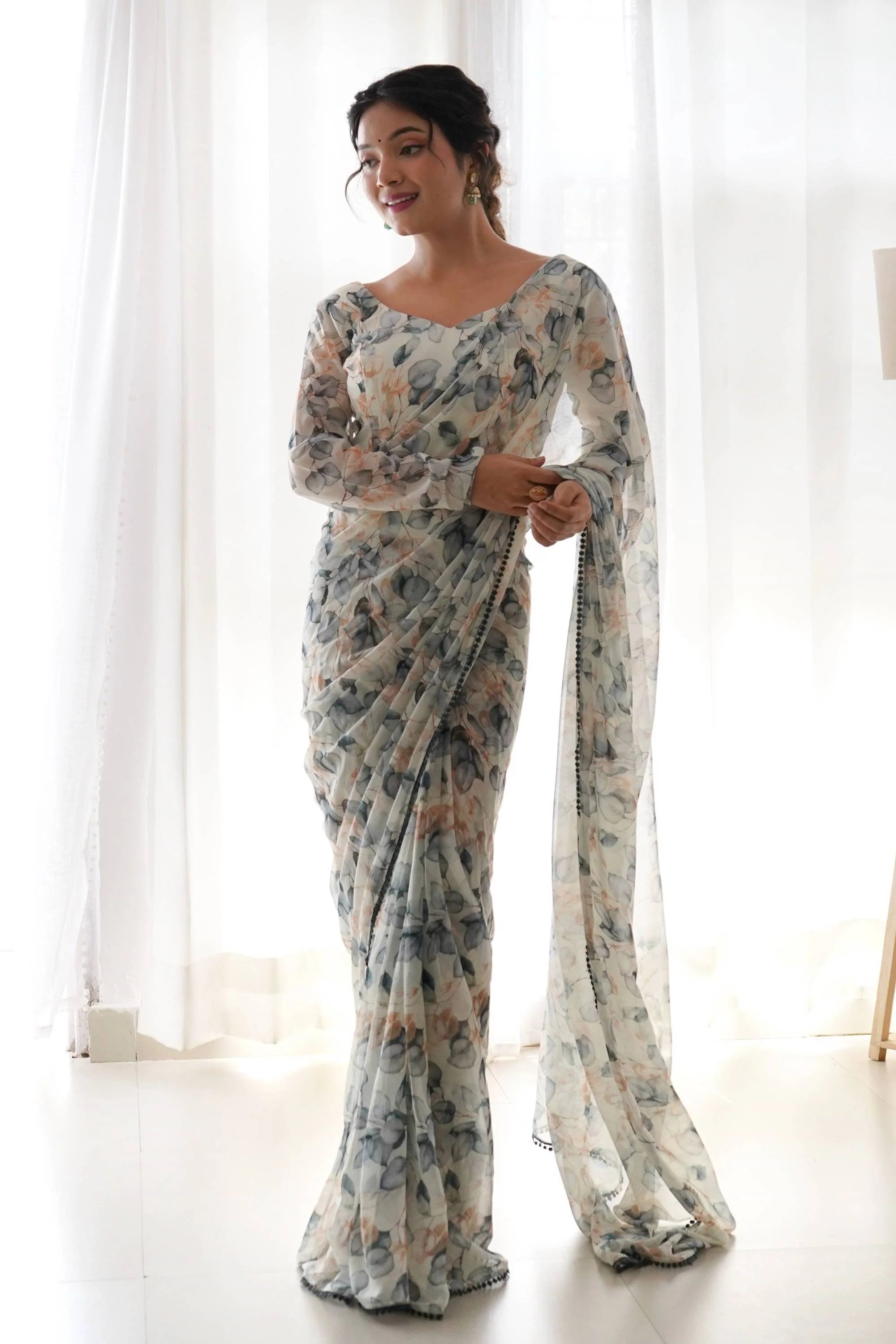 Step Up Your Style Game with This Gorgeous Cream Leaf Print Chiffon Saree