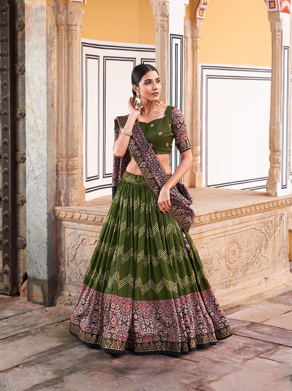 Tusser silk adorned with Ajarakh prints Green lehenga choli