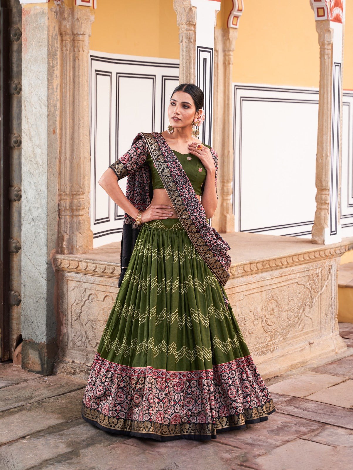 Tusser silk adorned with Ajarakh prints Green lehenga choli