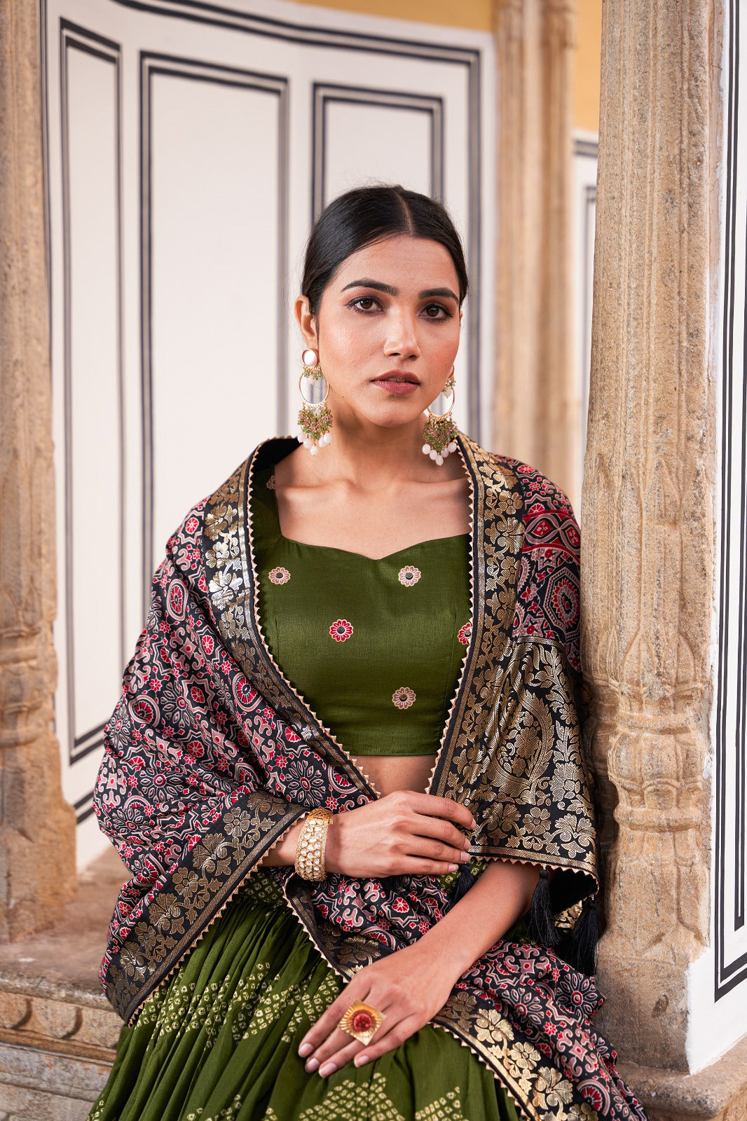 Tusser silk adorned with Ajarakh prints Green lehenga choli