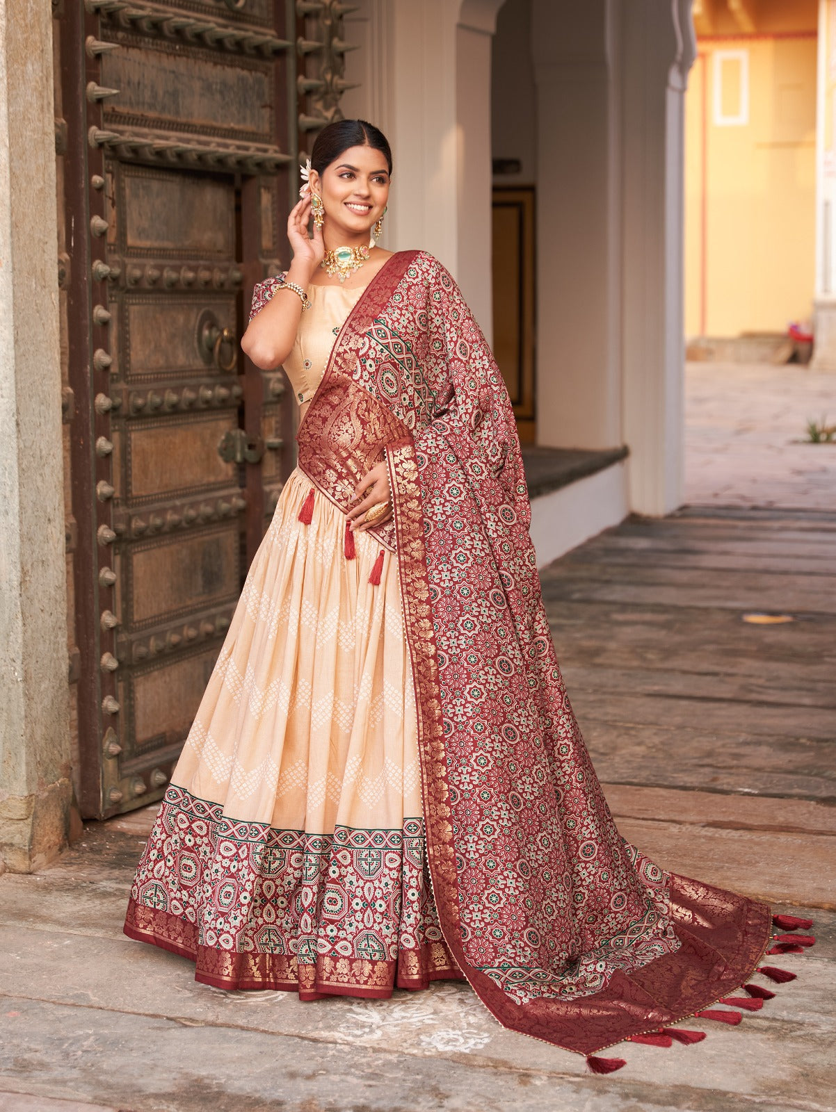 Tusser silk adorned with Ajarakh prints Cream lehenga choli